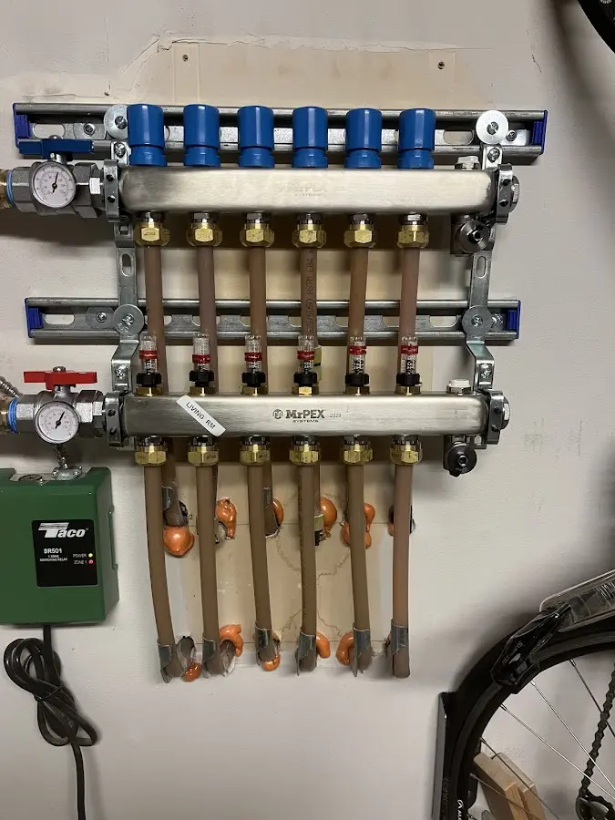 Plumber performing Leak Detection at a residential property in Maplewood